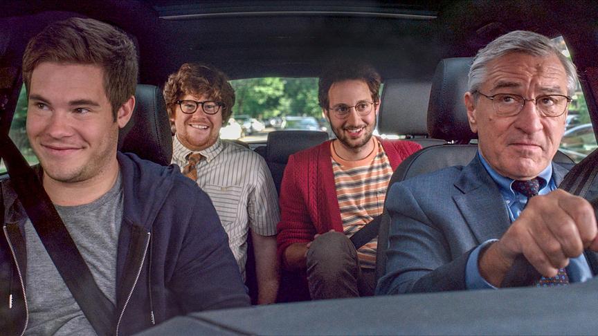 Vier Männer in einem Auto